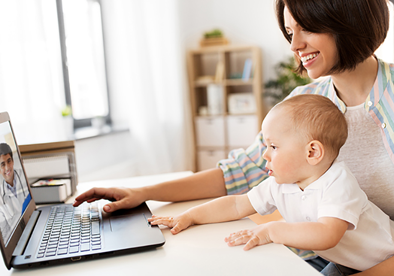 Mother and child using connect care as an online doctor option