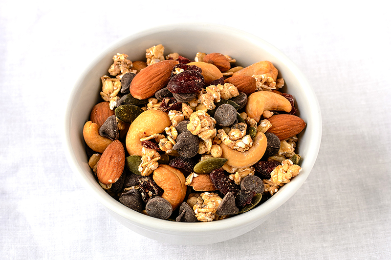 Recipe for trail mix with dried nuts and fruit with chocolate chips