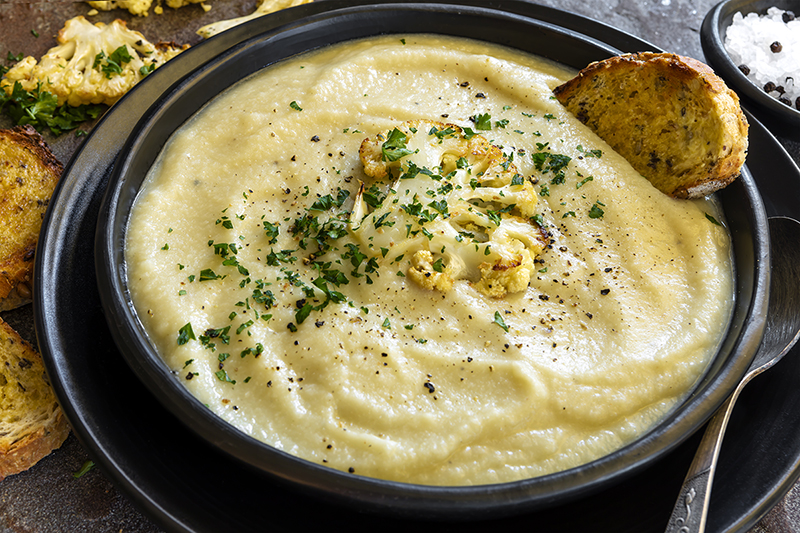 Roasted Cauliflower soup in a bowl, recipe for soup