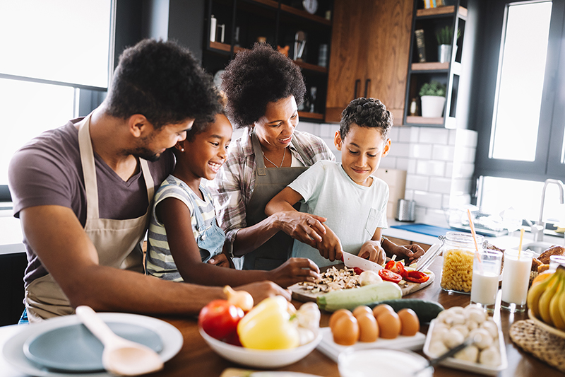 family cooking in the kitchen together, healthy meals to make during isolation