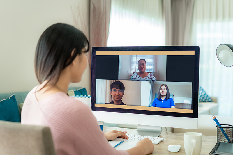 Woman at her computer, how to have a successful video interview