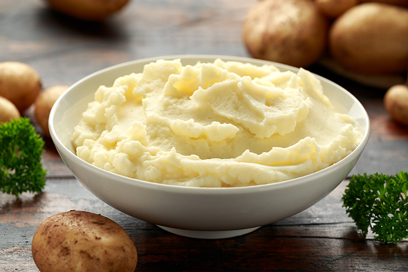 Creamy and light buttermilk mashed potatoes in a bowl, recipe lg