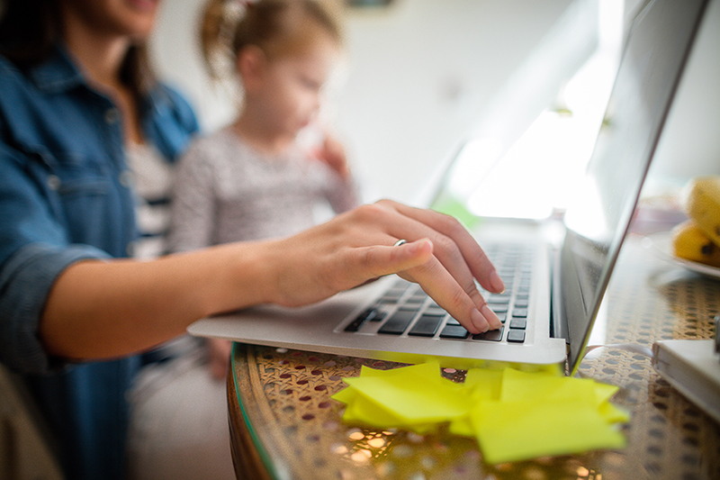 Woman downloading her ID card for health insurance, how to do that