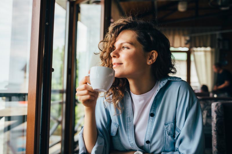 Calm women drinking coffee.