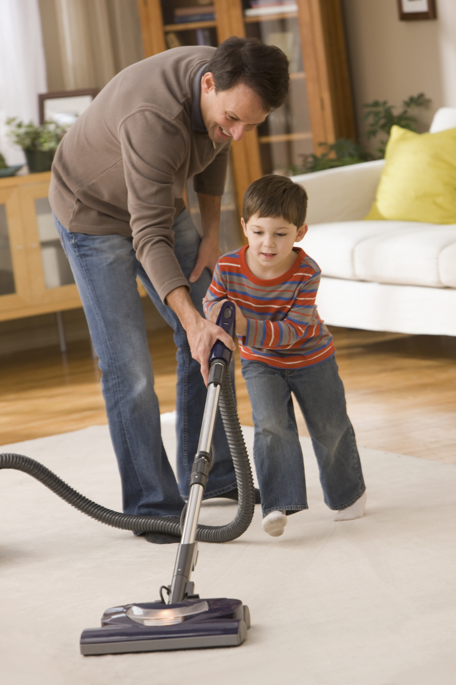 Father and Son Vacuuming