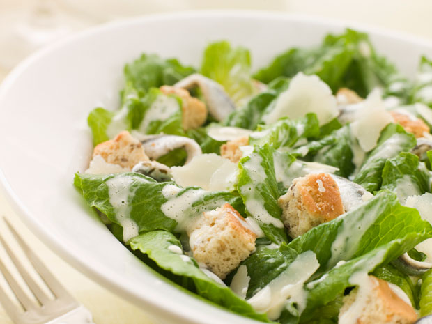 Caesar salad with croutons and dressing