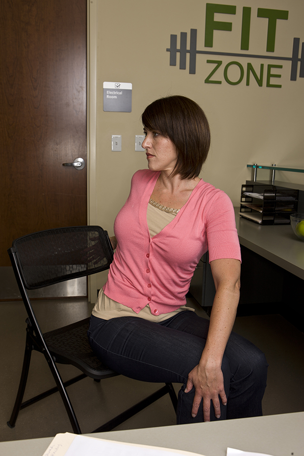 Woman doing chair yoga