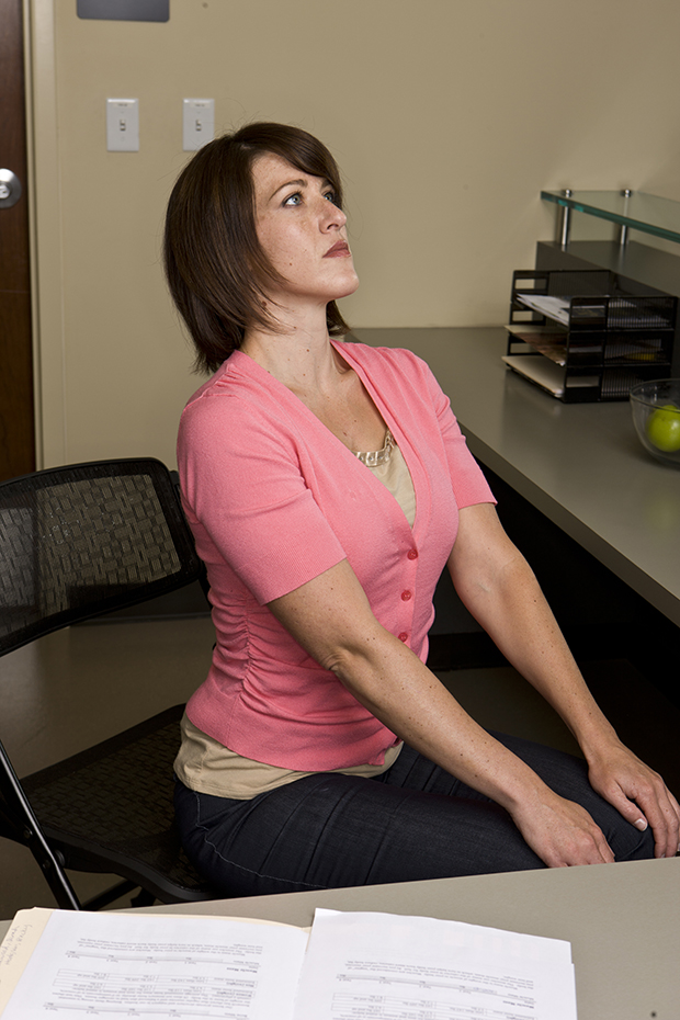 Woman doing chair yoga