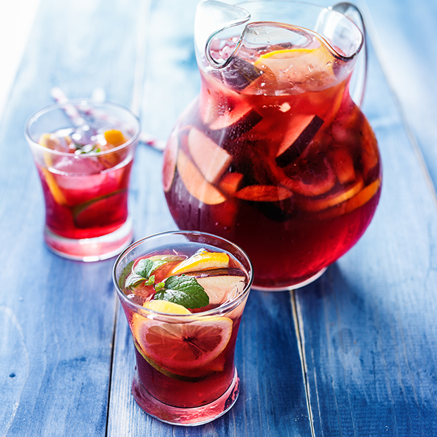 Family friendly fruit sangria recipe with apples, limes, and lemons