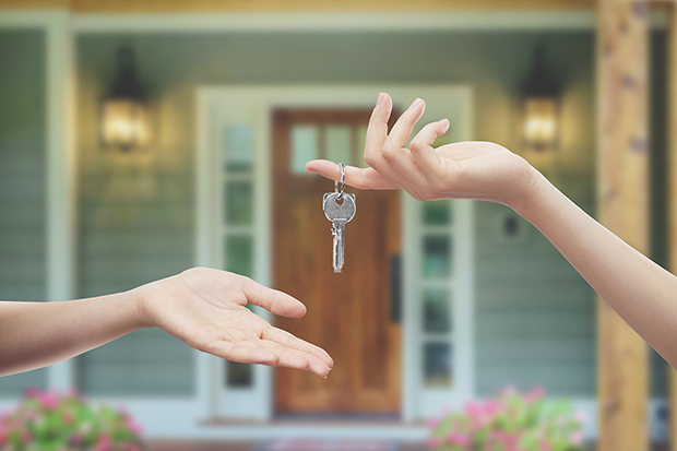 Handing over the keys to a new homeowner