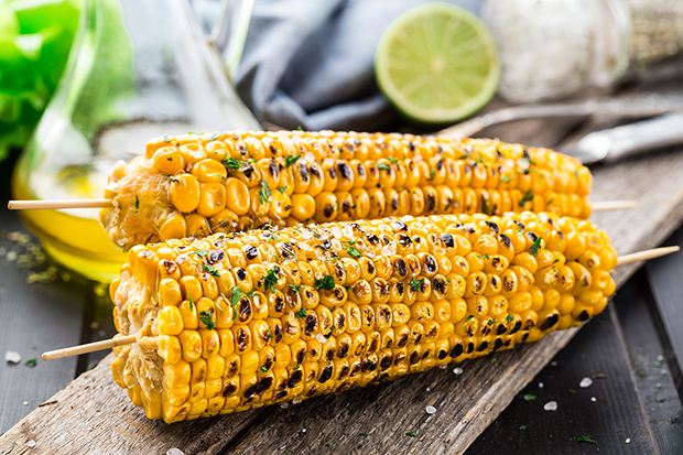 Grilled corn on the cob with basil recipe