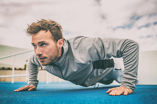 Premium Photo  Man struggling with doing push-ups