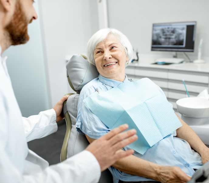 Woman in conversation with a dentist