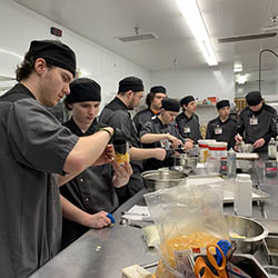 team members in kitchen for idaho awards